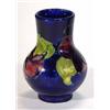 Image 1 : Moorcroft baluster vase, hand decorated with pansies onto a blue ground, impressed marks to base,…
