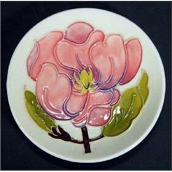 Circular Moorcroft dish, hand painted with ivory magnolia pattern, impressed marks to base, 12cm …