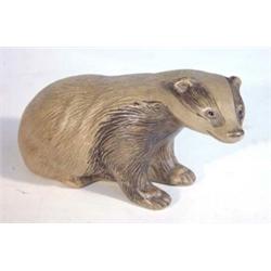 Poole Barbara Lindley Adams seated badger, impressed marks to base, 20cm in length…