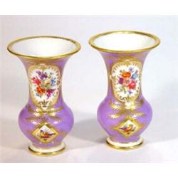 Pair of continental porcelain vases, hand painted and gilded with panels of flowers and birds ont…