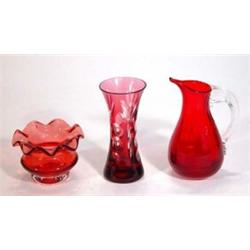 Cranberry glass pot with fluted rim, cranberry coloured glass vase and a red glass jug with clear…