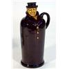 Image 1 : Brown and treacle glazed flask modelled as a gentleman in a brown jacket, 27cm high…