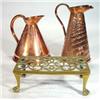 Image 1 : Crocodile skin effect copper jug, copper jug and a brass trivot with claw and ball feet…