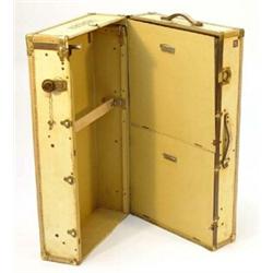 Gentlemans pig skin travelling trunk with a fitted interior enclosing cupboard space and hangers…