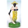 Image 1 : Large early hand painted papier maché negro banana cutter in a checked shirt and straw hat figure…