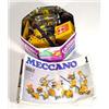 Image 1 : Tin of assorted yellow and blue meccano and instruction manual…