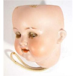 Hand painted Armand Marseille doll's head with open and close eyes and open mouth and teeth, mark…