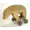 Image 1 : Possibly Steiff straw filled bear on cast iron wheels, 27cm high…