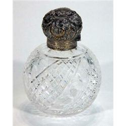 Heavily cut glass silver topped floral design scent bottle and cover, Birmingham 1907, 14cm high…