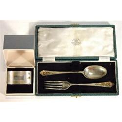 Cased Mappin and Webb silver fork and spoon set and a cased silver knapkin ring…