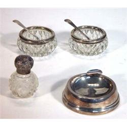 Circular silver ashtray, two cut glass silver rimmed salts, cut glass silver topped scent bottle …