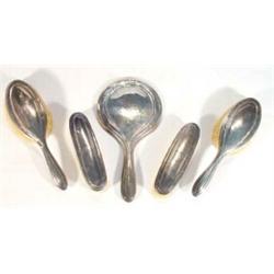 Five piece silver backed dressing set comprising hand mirror, two hand brushes and two clothes br…