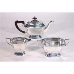 Silver plated three piece teaset, comprised teapot, milk and sugar with ebonised knop and handle…