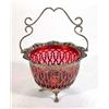 Image 1 : Pierced silver plated basket with swing handle and cranberry glass liner, 18cm high…