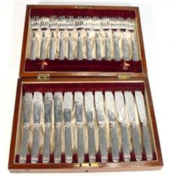 Mahogany cased set of twelve silver plated fish knives and forks with floral chased blades…