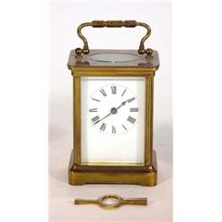 Small brass carriage clock, the enamel dial for Trimnell, Canterbury, 18cm high…