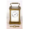 Image 1 : Small brass carriage clock, the enamel dial for Trimnell, Canterbury, 18cm high…