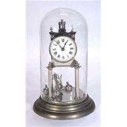 Gustav Becker anniversary clock under a glass dome…