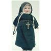 Image 1 : A small Armand Marseille bisque doll, mould 390, with jointed composition body, dressed as a nun...
