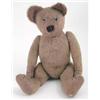 Image 1 : An early English teddy bear, with glass eyes and hump back (plush worn) 19ins...