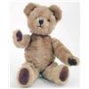 Image 1 : An English teddy bear, in gold plush with plastic eyes and velvet pads, each ear containing a bel...