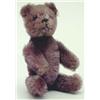 Image 1 : A Schuco lilac plush teddy bear compact, detachable head releases hinged abdomen, all limbs joint...