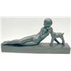 Image 1 : An Art Deco style earthenware figure of a nude female, lying and stroking a lamb, glazed in bronz...