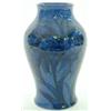 Image 1 : A Moorcroft blue-glazed baluster vase, painted with a late Cornflower design of fruiting flowers...