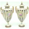 Image 1 : A good pair of Royal Crown Derby two-handled vases and covers, urn-shaped, each finely painted wi...