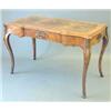 Image 1 : A Victorian inlaid figured walnut writing table, with leather skiver over a frieze drawer on cabr...