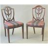 Image 1 : A set of eight 19th century Hepplewhite design mahogany dining chairs, the shield shape backs wit...