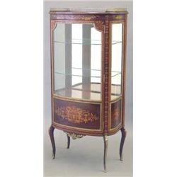 An early 20th century mahogany, marquetry and gilt metal mounted vitrine, with bow front plate gl...