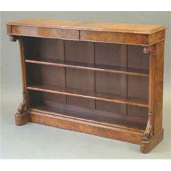 A Victorian figured walnut open dwarf bookcase, flanked by leaf scroll capitals, on plinth base,...