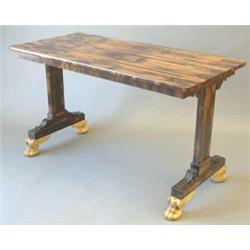 A fine Regency coromandel rectangular top centre table, on standard end supports with scroll orna...