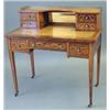 Image 1 : An Edwardian inlaid rosewood writing desk, with brass galleried bank of four small drawers, toole...