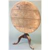 Image 1 : An 18th century elm circular occasional table with vase stem and tripod, 2ft.9ins....