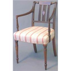 A set of four Sheraton mahogany elbow chairs, with string inlaid multi stick backs with reeded ar...