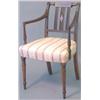 Image 1 : A set of four Sheraton mahogany elbow chairs, with string inlaid multi stick backs with reeded ar...