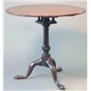 Image 1 : A George III mahogany circular occasional table, with bird cage, and tapered stem with spiral flu...