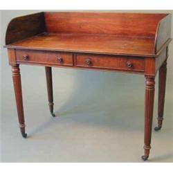 A George IV mahogany washstand, with splash back and two frieze drawers, fitted wood knob handles...