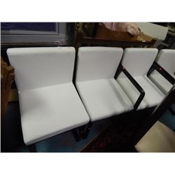 WHITE LEATHER UPHOLSTERED CHAIRS - NO ARMS