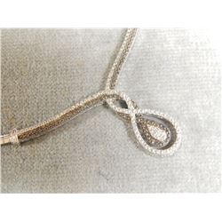 NECKLACE - .025 BLACK AND WHITE DIAMONDS - SET IN STERLING SILVER  WITH FRONTAL TWIST DESIGN - INCLU