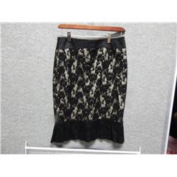 LADIES SKIRT - USED - LE CHATEAU - BLACK - LACE OVERLAY AND PLEATES ON BOTTOM - SIZE 3/4