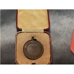 VINTAGE 1934 MEDAL - "ROYAL LIFE SAVING EST. 1891" IN VINTAGE CASE