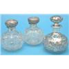 Image 1 : A pair of silver mounted cut glass scent bottles and an overlaid bottle....