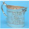 Image 1 : A Dutch white metal cream jug, decorated with canal scenes....