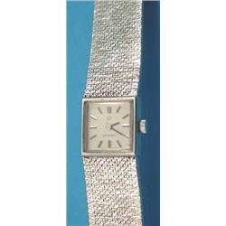 A Lady S 9ct White Gold Omega Wrist Watch With Square Dial And Textured Bracelet