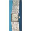 Image 1 : A lady's 9ct white gold Omega wrist watch with square dial and textured bracelet....