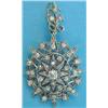 Image 1 : A Victorian diamond set gold and silver pendant/brooch, of oval openwork star design with detacha...