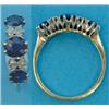 Image 1 : A gold 3-stone sapphire ring, the claw set oval sapphires spaced by 2 pairs of small diamonds...